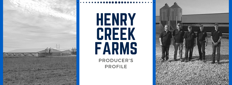 Henry Creek Farms with a farm building on the left and a owners on the right.