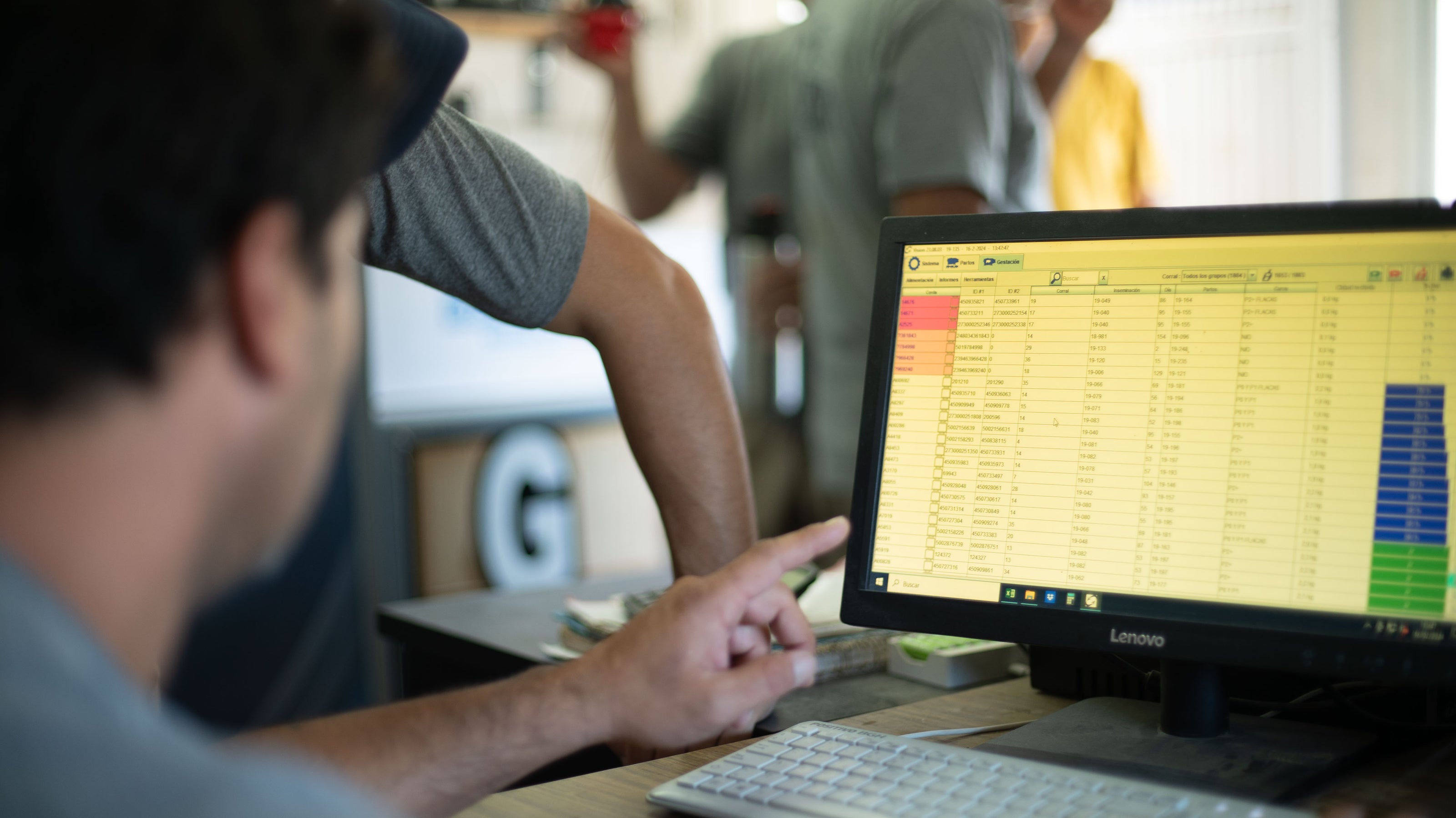 Office barn worker using VISION management software